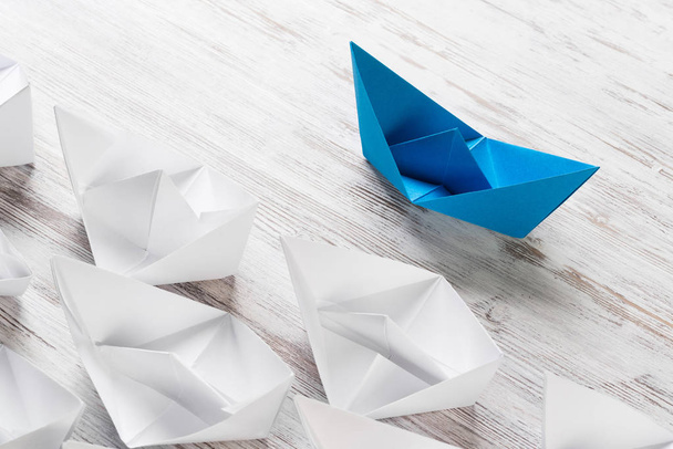 Set of origami boats on wooden table  - Fotó, kép