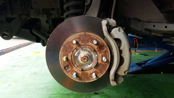 rust on disc brake system of car - Photo, Image
