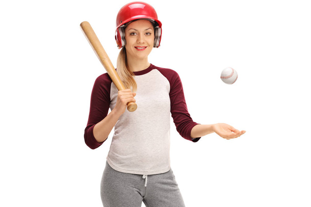 Woman with a baseball and a bat - Φωτογραφία, εικόνα