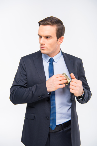 Young businessman with money  - 写真・画像