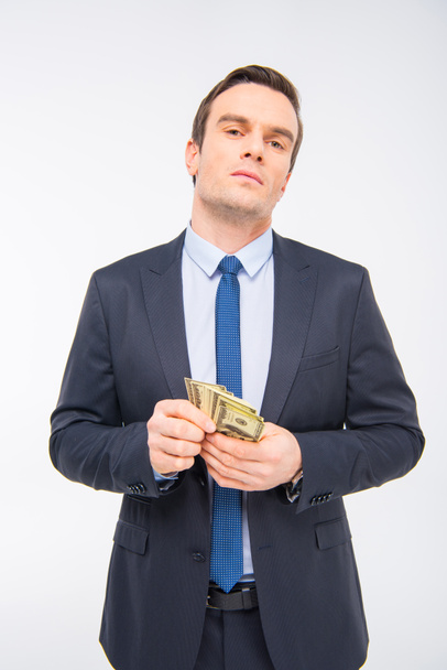 Young businessman with money  - Fotó, kép