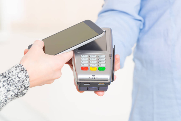 Paying contactless with smart phone - Photo, Image