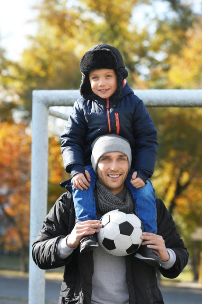 Father and son with ball - Photo, image