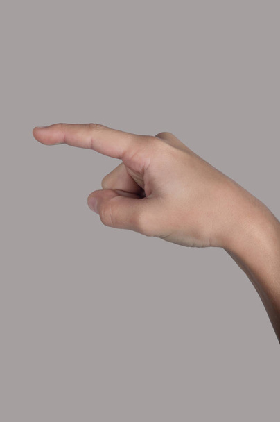 Ανθρώπινο χέρι δείχνοντας από το σημείο το δάχτυλό - Φωτογραφία, εικόνα