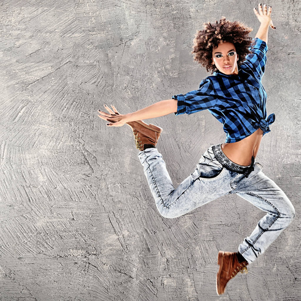 Young girl dancing, jumping. - Photo, image