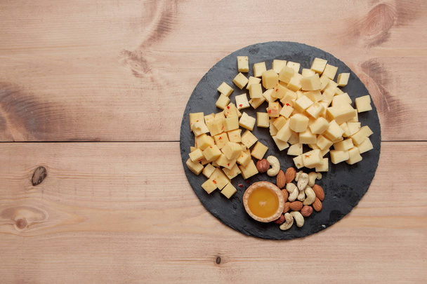 plate with cheese - Фото, зображення