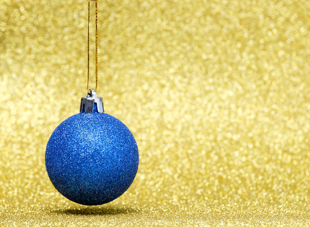 Christmas decorations on a glitter background - Foto, Imagen