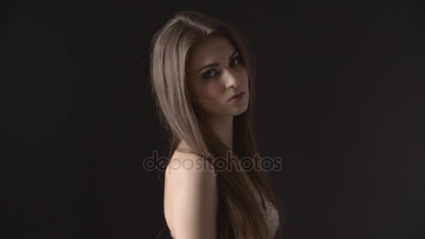 young woman in evening dress - Filmati, video