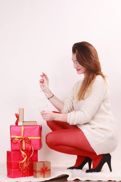 Woman with many christmas gift boxes - Fotoğraf, Görsel