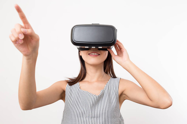 Woman watching with VR device - Photo, image