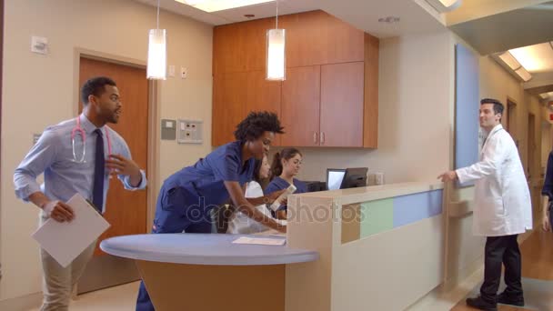 Medical Staff At Busy Nurses Station  - Felvétel, videó