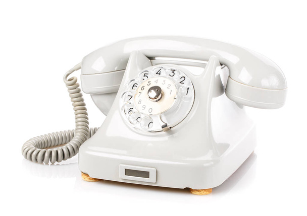 rotációs telefon egy fehér háttér - Fotó, kép