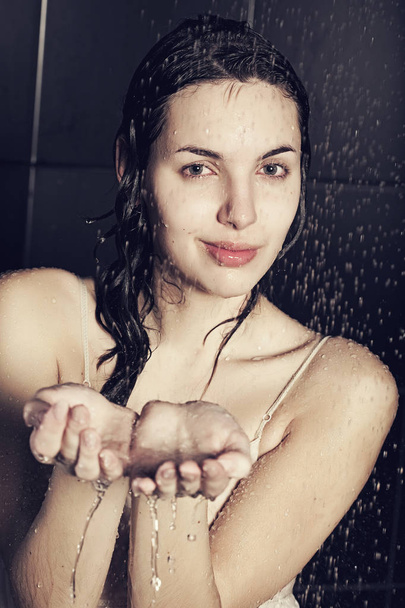 young cute woman with water - Foto, Imagem