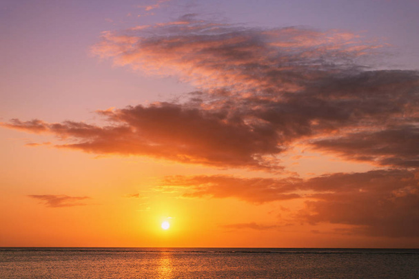 Sunset over the ocean - Fotó, kép
