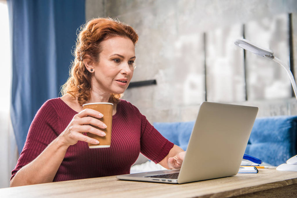Woman using laptop  - Photo, image