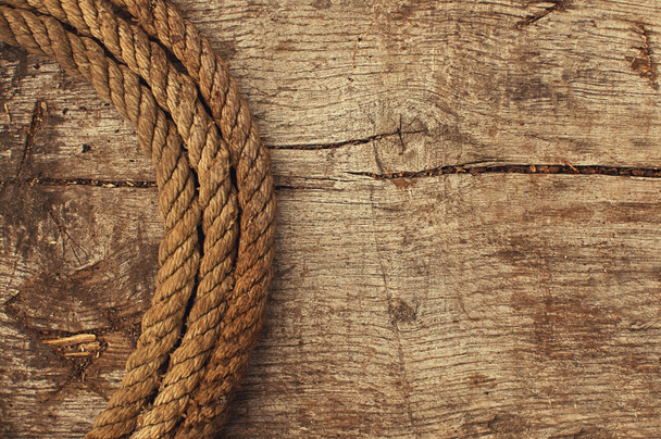 Ship rope and weathered wood background - Photo, image
