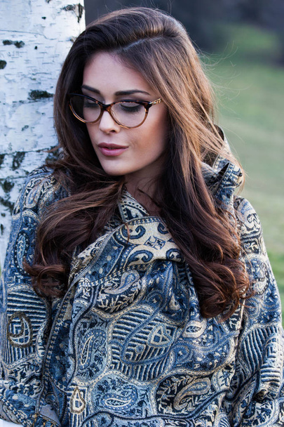 girl portrait with eyeglasses and scarf outdoor  - Photo, Image