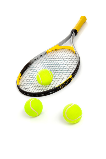Tennis racket and balls on white - Фото, изображение