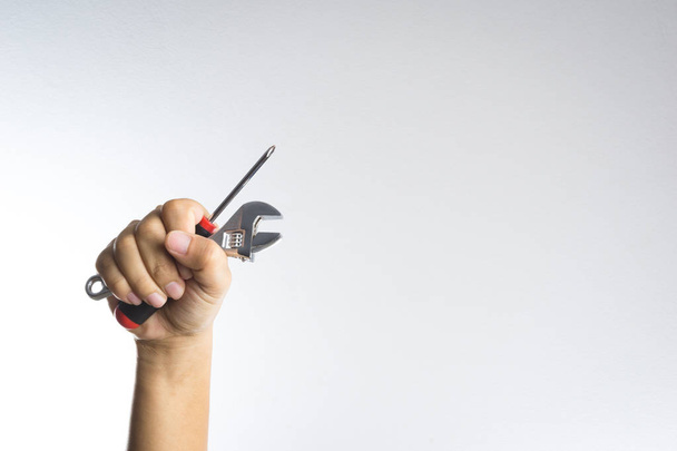 Hand holding screwdriver - Foto, Imagen