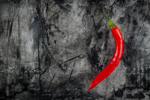Fresh chili on grunge scratched background.  - Φωτογραφία, εικόνα