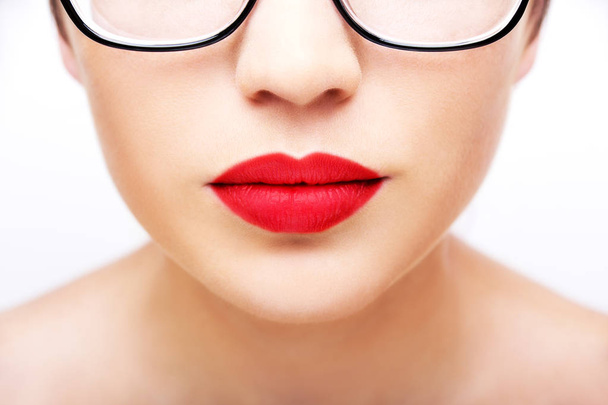 Plump sexy lips and perfect skin on a white background - Valokuva, kuva