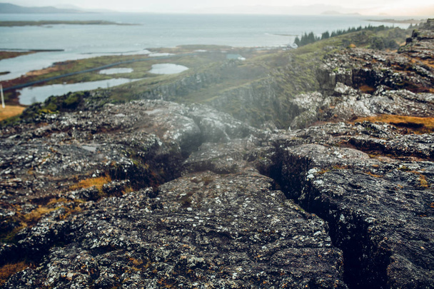 Lava on ground in mountain hills - Foto, imagen