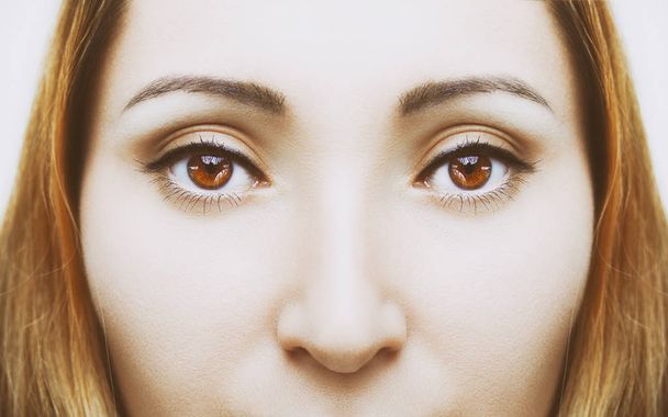 Beautiful insightful look brown woman's eyes - Foto, imagen