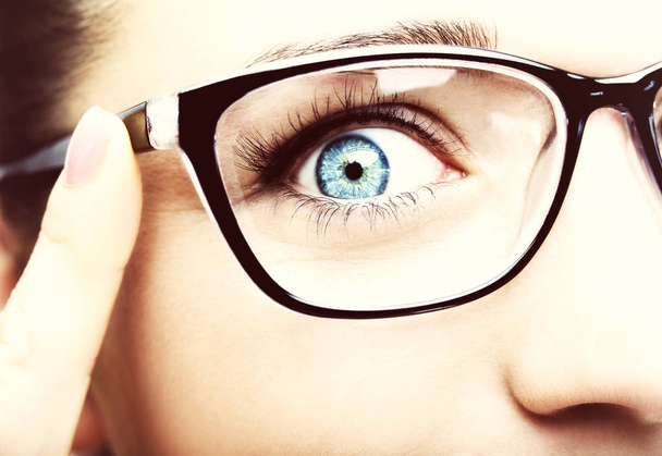 Beautiful young woman wearing glasses close-up isolated on white - Valokuva, kuva