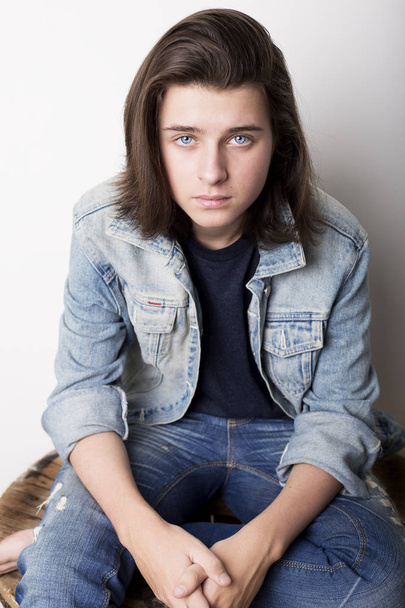 Fashion portrait of a teenager wearing jeans jacket - Photo, Image
