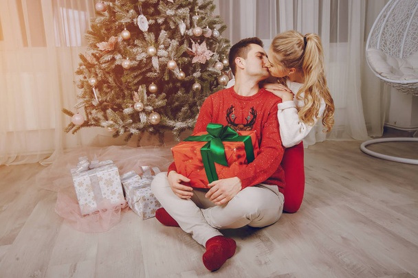 loving couple decorating Christmas tree - Foto, immagini