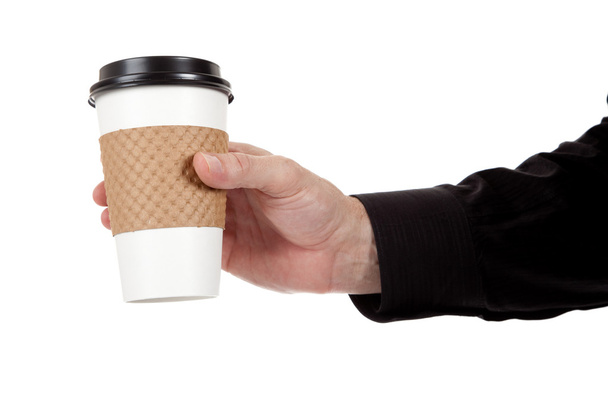 Man holding a paper coffee cup on white - Photo, image