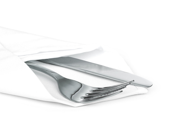 Cuchillo y tenedor con servilleta de lino en blanco
 - Foto, imagen