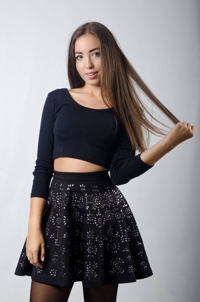 beautiful girl in skirt and top - Фото, изображение