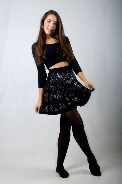 beautiful girl in skirt and top - Фото, изображение