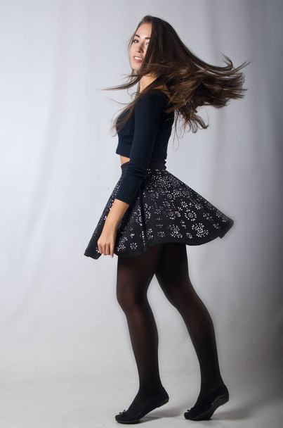 beautiful girl in skirt and top - Fotó, kép
