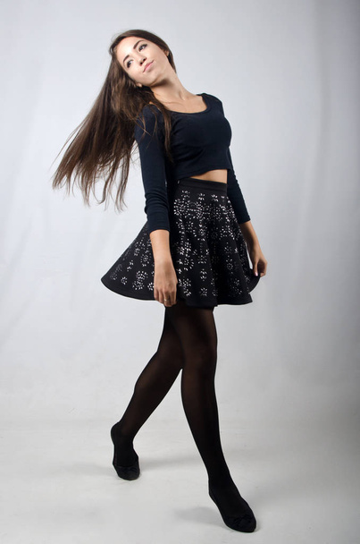 beautiful girl in skirt and top - Фото, зображення