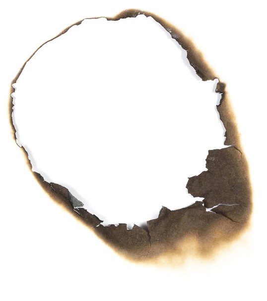 Spalone otwór w białej księdze - Zdjęcie, obraz