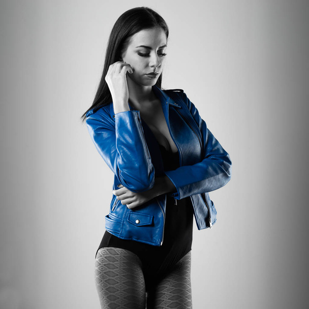 Young pretty model woman posing in studio - Valokuva, kuva