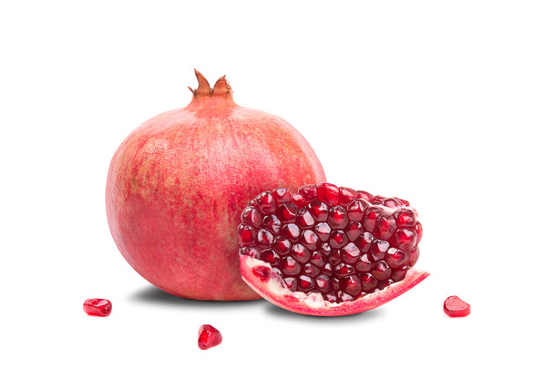 Juicy pomegranate fruit lies on a white background - Photo, Image