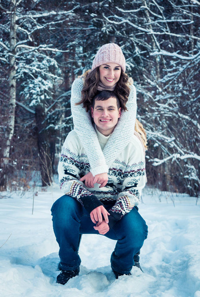 Couple hugs in winter forest - Photo, Image