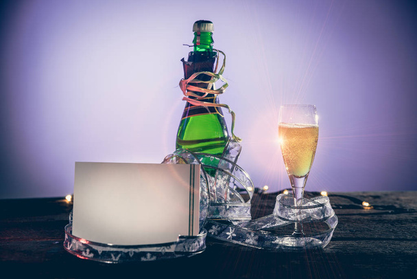 champagne glass and bottle - Фото, изображение