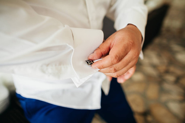groom wear cufflink close up - Фото, изображение