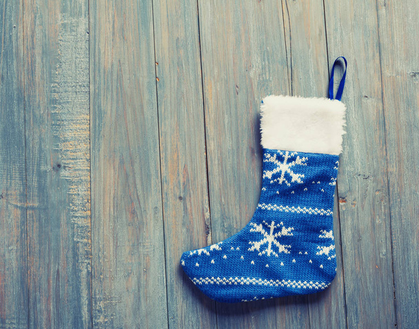 Christmas sock with on wooden background - Photo, Image