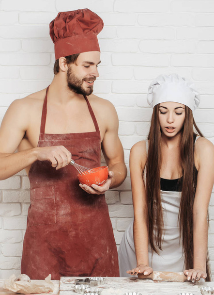 Man and girl on kitchen - Фото, изображение