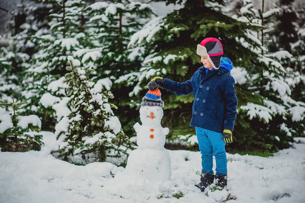 snowman winter boy child - Foto, afbeelding
