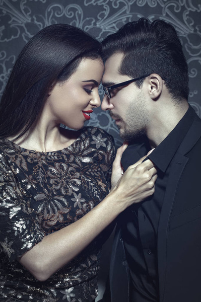 Sexy woman grab smart rich man by collar - Photo, Image