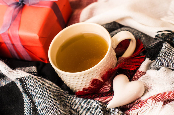 Cup of tea and scarf - Photo, Image