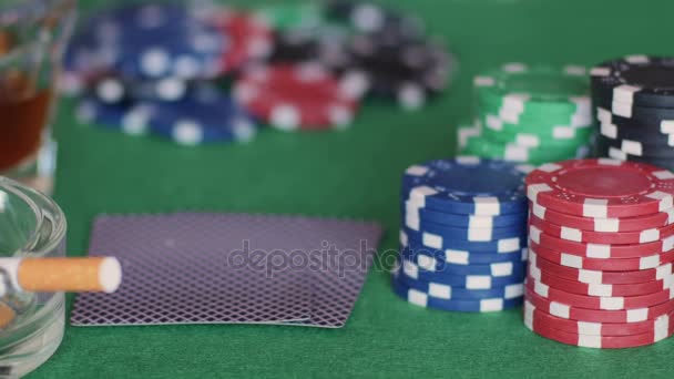 Whisky, cigarette, cards and chips on poker table - Video, Çekim