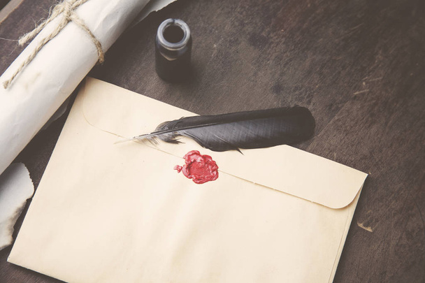 Old feather, envelope, sealing wax - 写真・画像