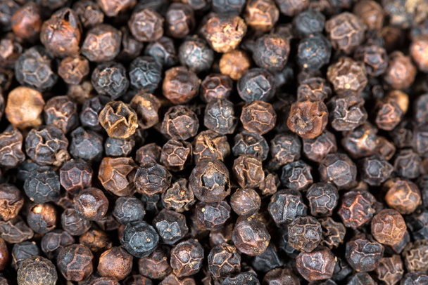 Fondo con granos de pimienta negra
 - Foto, Imagen